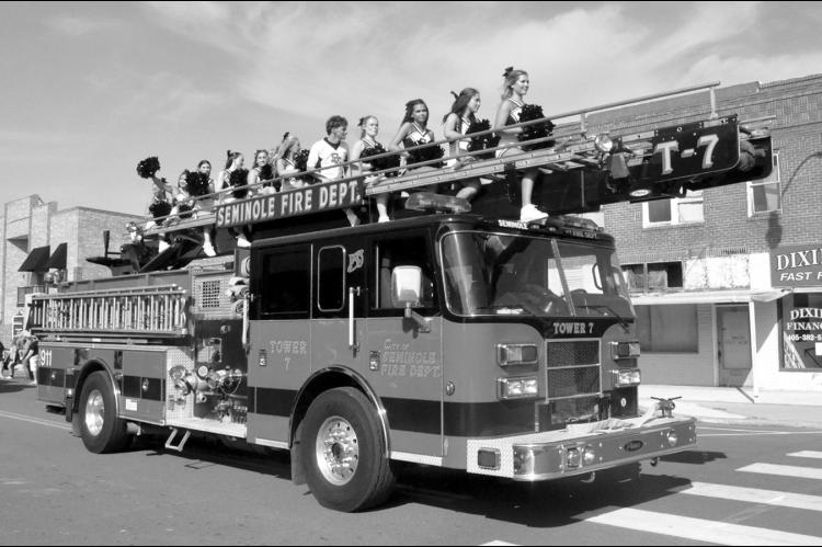 Right, the Seminole High School cheerleaders made a fiery entrance in last Friday’s 2026 homecoming parade on Main Street. The parade featured an array of class floats, the homecoming court, the SHS marching band and more. Homecoming weekend was full of activities, including the first ever alumni tailgate party, the Annual ESA Soup and Stew Dinner, the Alumni Hall of Fame induction ceremony and an all-class reunion at the Reynolds Wellness Center Saturday night. —Staff Photo by Bill Anderson