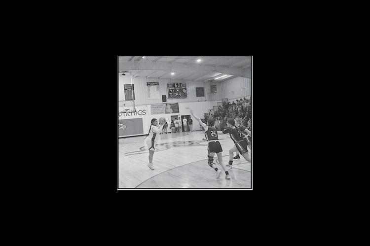 Sasakwa Lady Viking McKayla Harjo shoots from three-point range Tuesday night. Staff Photo by Bill Anderson