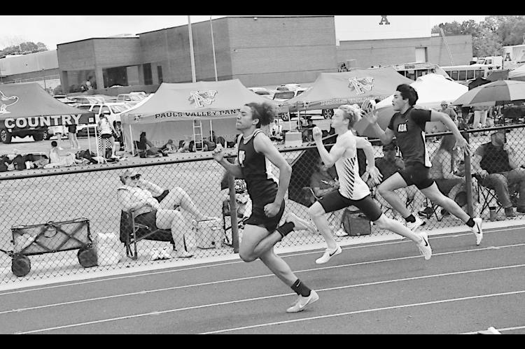 Wewoka Tiger Nadium Brunder leads the race in the 100M Friday at Ada. Staff Photo by Bill Anderson