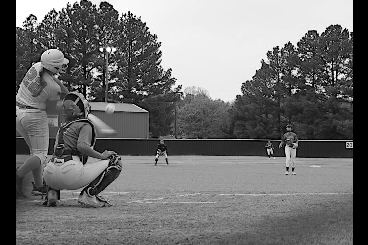 Strother Lady Yellowjacket Ludie Barrett-Higgins knocks one out to the outfield Monday. Staff Photo by Sunny G. Weddle