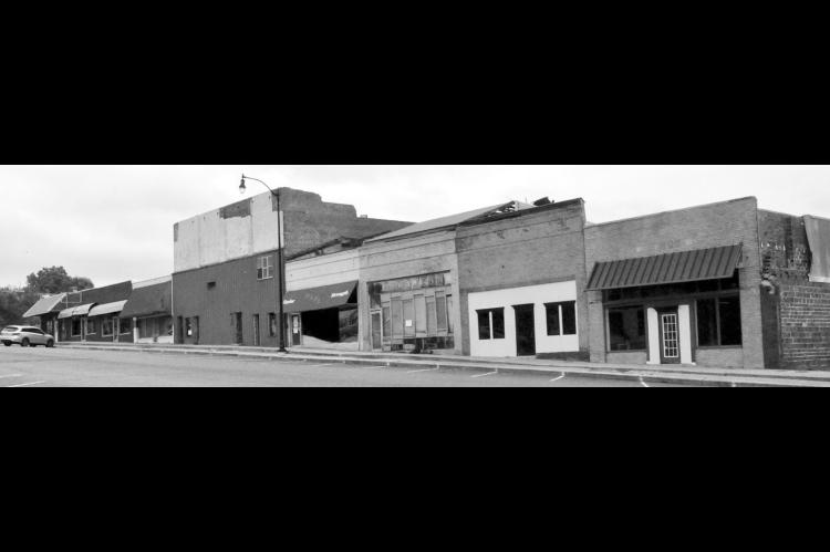 This stretch of buildings on the south end of Main Street is targeted for demolition by the City of Seminole through the assistance of the Department of Defense’s Innovative Readiness Training Program. Addresses included on the demolition list are 150, 132, 130, 126, 120, 118, 116, and 114 N. Main Street. Demolition is expected to take place between October 2026 and September 2027. —Staff photo by Bill Anderson