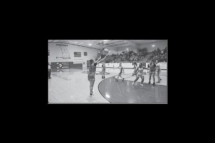 Sasakwa Lady Viking Addy Odom takes her shot from three-point range Friday night. Staff Photo by Bill Anderson
