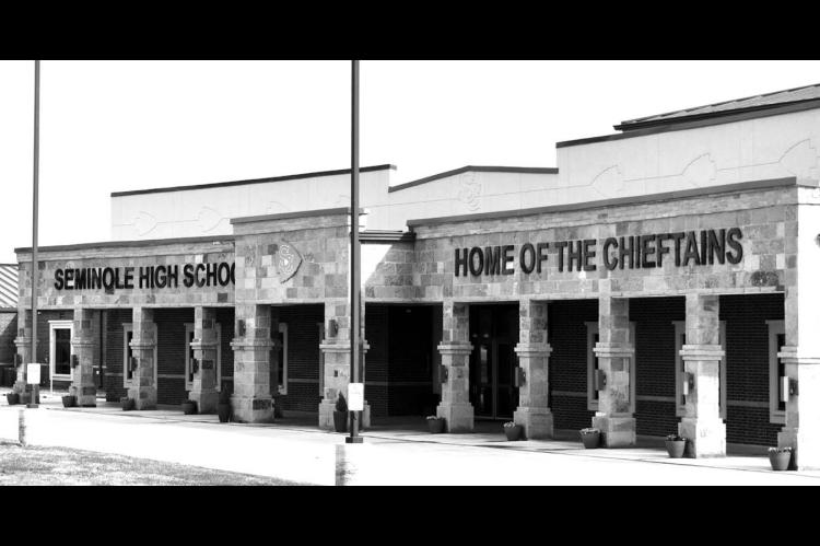 Pictured at left is Seminole High School, which opened its doors to students five years ago this month. The Seminole Public School District is suing the architectural firm and the construction company behind the project, alleging that their negligence has