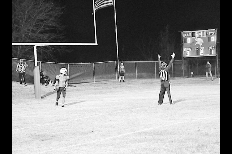 Sasakwa Viking wide receiver Titan Collins catches the pass and runs in for the touchdown. Staff Photo by Bill Anderson