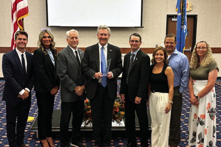 Security State Bank of Oklahoma staff accepts an award for community commitment at Seminole State College on August 4. Pictured left to right: Jesse Grandstaff, Micha Baker, Mark Schell, Tip Burch, Kassie Kincade, Aubie Keesee, John Worthy and Christi Rid