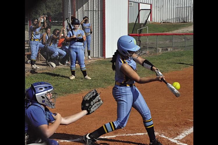 New Lima Falconette Jaylee Ipock gets a hold of one Thursday afternoon. Staff Photo by Bill Anderson