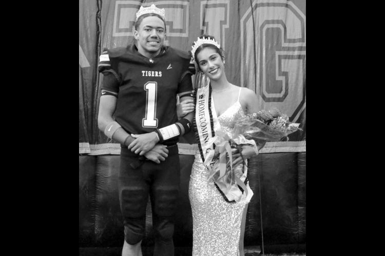 Nadim Bruner (left) and Emma Slovacek were crowned Wewoka High School’s Homecoming King and Queen just before Friday night’s game against Wayne. The Wewoka Tigers dominated the Wayne Bulldogs 46-20. —Staff Photo by Bill Anderson