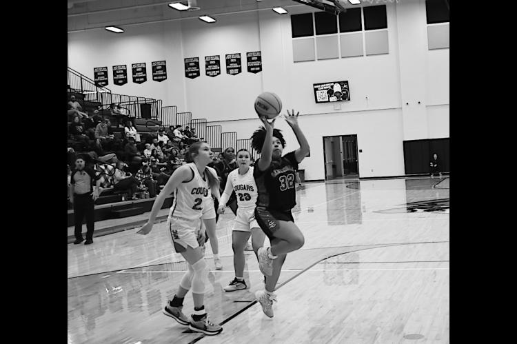 Seminole Lady Chieftain Jakayiah Andrews shoots the jumper Saturday night. Staff Photo by Andy Wilson