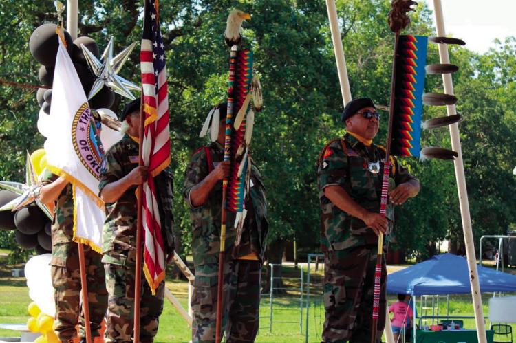 The Seminole Nation Honor Guard, which is dedicated to honoring fallen members of the military, particularly Seminole veterans, presents the colors at an event last Saturday in Konawa. On Wednesday, Aug. 20, the “Season of the Warrior” project tour wi