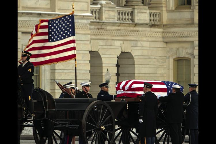 Former President Carter Takes Final Ride to Washington, DC
