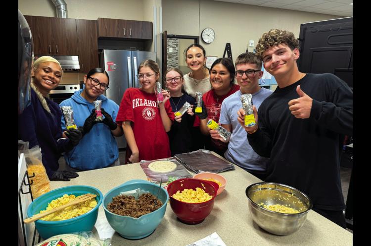 Seminole FCCLA members spent the day making breakfast burritos for Wilson Elementary 3rd graders, to provide them with a nutritious protein packed breakfast before their state test. They also provided a note of encouragement and decorative stickers to each burrito. Seminole FFA donated the Blue and Gold sausage. (Courtesy photo)