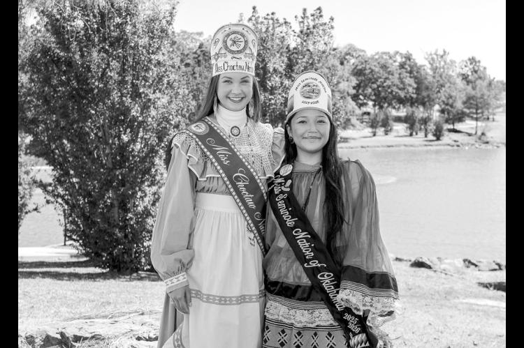 Miss Choctaw Nation Mia Reich (left) and Miss Seminole Nation Alivia Wapskineh stand in front of the south pond on Seminole State College’s campus. Both are President’s Leadership Class scholarship recipients who balance campus involvement with service to their tribal communities. (Photo provided)