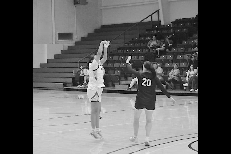 Seminole State Lady Belle and former Varnum Lady Whippet Hailey Mack knocks down a three-point shot Monday. Staff Photo by Bill Anderson