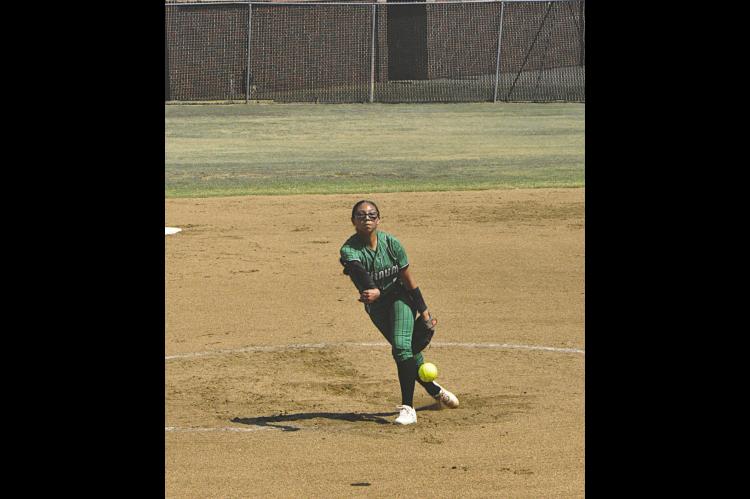Varnum Lady Whippet Cori Vigil throws a strike against Konawa Thursday. Staff Photo by Bill Anderson