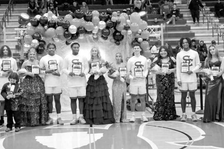 Christian Brager and Reyley Stanfill were crowned Seminole High School’s Homecoming King and Queen Friday night, Feb. 6. Pictured l-r are Daisy Wood, Tyce Bruner, Jaxie Satawake, Donavin Garfield, Brager, Stanfill, Ava Yarbrough, Ben Schatzel, Elsie McG