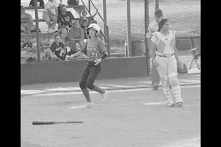 Varnum Lady Whippet Karsyn Lowery scores a run for Varnum. Staff Photo by Bill Anderson
