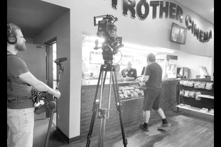 Film-makers from Cinema United, a trade organization for movie theaters nationwide, chose Seminole’s Strother Twin Cinema as the focus for a promotional film to be shown at their annual convention. The film crew was in Seminole on Wednesday and filmed owners Steve and Lisa Schoaps all day. The community turned out in support, filling the auditoriums for the 7 p.m. presentations. —Photo by Karen Anson