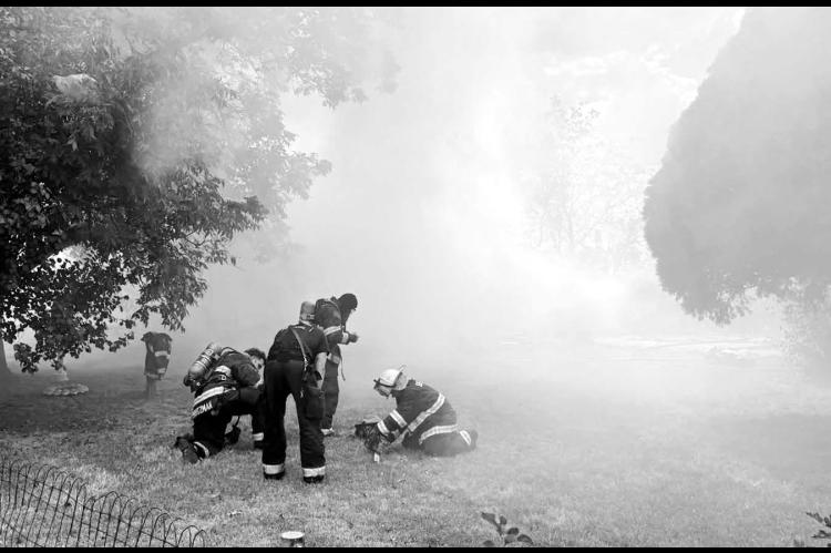 What began as a grassfire quickly became a structure fire on Union Avenue early Sunday afternoon. Firefighters from multiple agencies, including the Seminole, Bowlegs and Strother Fire Departments and the Bureau of Indian Affairs, braved the brutal heat to take down the blaze. —Photo courtesy Seminole FOP