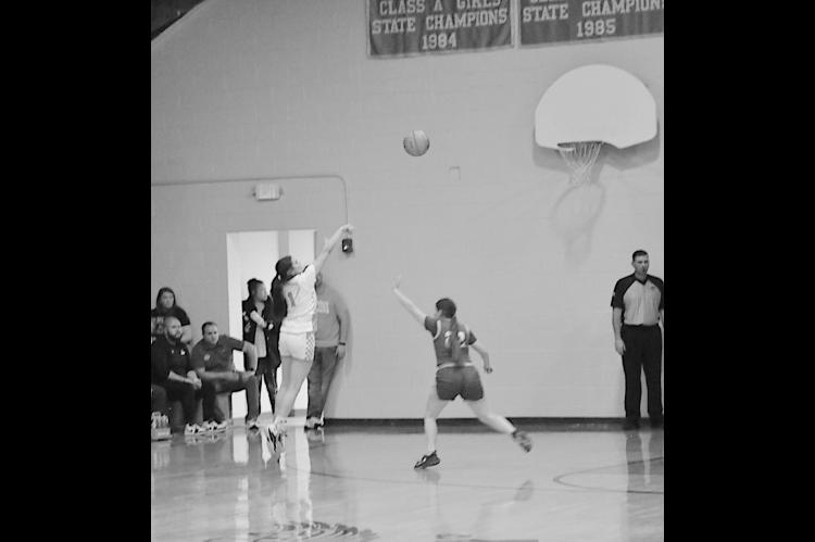 New Lima Falconette Jaylee Ipock takes the shot from three-point range. Staff Photo by Bill Anderson