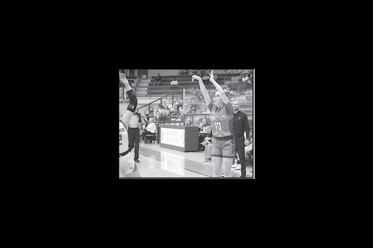 Varnum Lady Whippet Ashlyn White-Richards takes the shot from three-point range Thursday. Courtesy Photo by Jeanne Gosa