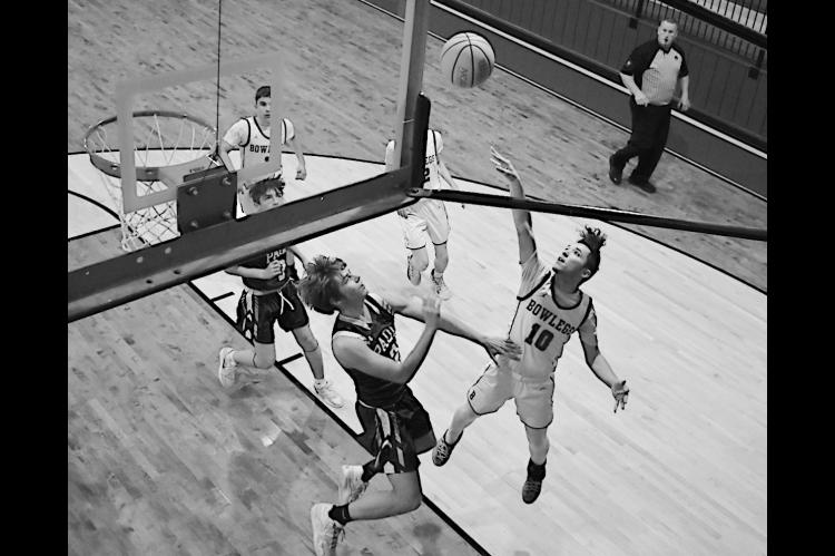 Bowlegs Bison Cayxin Parsons shoots one-handed for the basket Friday night. \\Staff Photo by Andy Wilson
