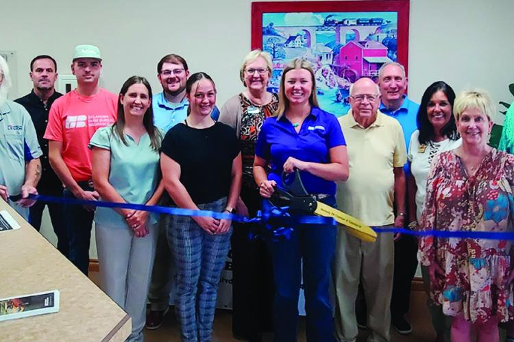 Seminole County Farm Bureau Agent Karley Fewel (center) was joined by friends, community leaders and members of the Seminole Chamber of Commerce for a ribbon cutting ceremony Thursday, Sept. 18. Fewel’s office is located at 1801 W. Wrangler Blvd. —Cou