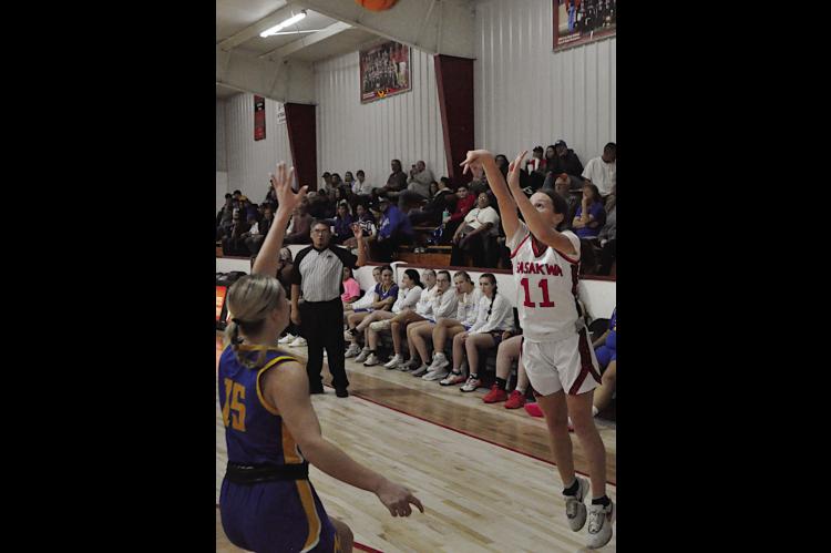 Sasakwa Lady Viking Addy Odom shoots the threepoint shot Tuesday night against Moss Staff Photo by Bill Anderson