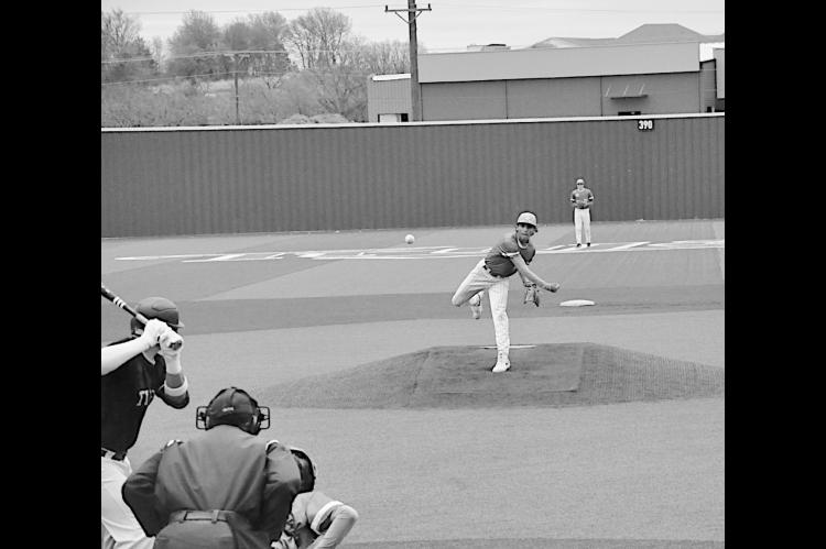 Seminole Chieftain pitcher Ostin Bighead delivers the fast ball Friday. Staff Photo by Bill Anderson