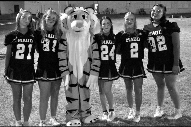 The Maud Tiger cheerleaders were on hand to help lead the Tigers to a 36-0 victory over Cave Springs Friday night. Pictured l-r are Nevaeh Bicek, Presley Porterfield, Lawson Peters (mascot), Chloe Peters, Payton Collins and Aloyna Siqueiros. The Tigers travel to Graham-Dustin this Friday night. —Staff Photo by Bill Anderson