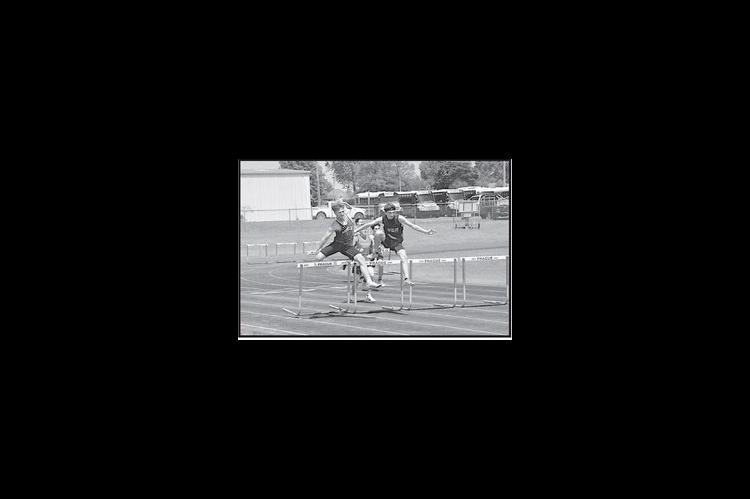 Varnum Whippet Kamell Stewart competes in the boys 110m hurdles Friday. Staff Photo by Bill Anderson