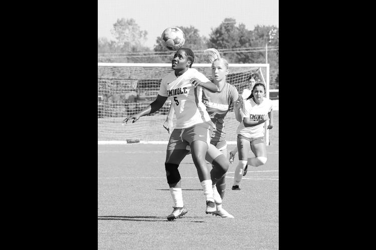 Seminole State Lady Trojan Fredricka Finnikin uses her head to control the ball. Courtey Photo by Glen Bryan