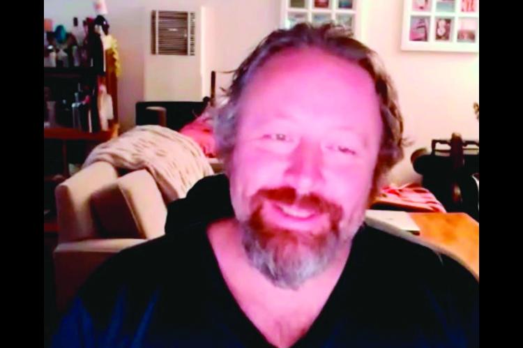 Above: Matt Axton, son of acclaimed singer/ songwriter and actor Hoyt Axton, tells the story of “Joy to The World” during a recent Zoom call with the Seminole Producer’s editor. Right: Matt in performance.