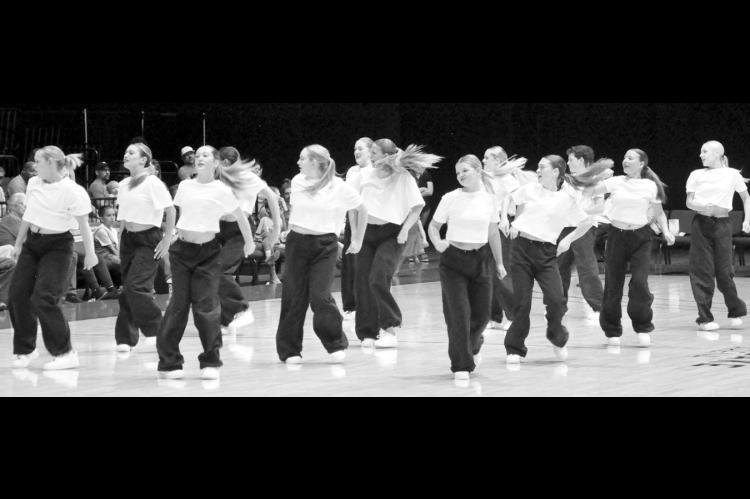 A dance troupe dazzles the crowd with their moves during Friday night’s Potawatomi Fire basketball game against San Antonio at Firelake Arena in Shawnee. The Fire scored a huge 138-81 win over San Antonio and clinched the Central Conference title for th
