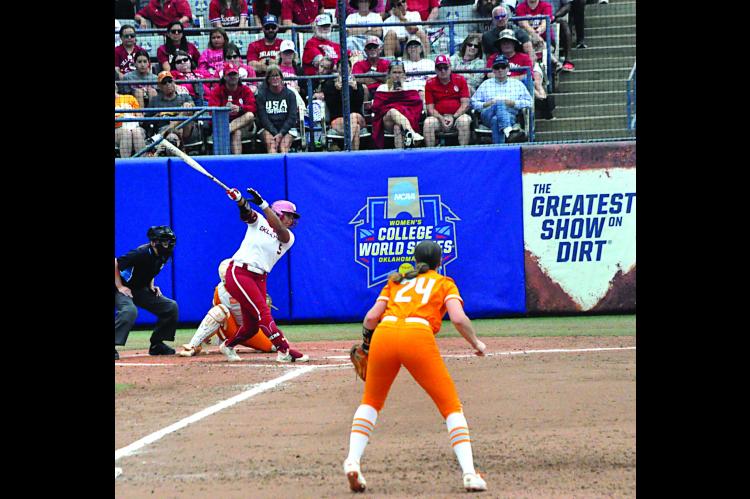 OU Ella Parker just misses the throw before hitting her first homerun of the game Thursday. Staff Photo by Bill Anderson