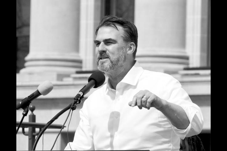 Gov. Kevin Stitt, pictured March 12 speaking at a rally outside the state Capitol, named an interim commissioner for the Oklahoma mental health department Tuesday. (Photo by Emma Murphy/Oklahoma Voice)