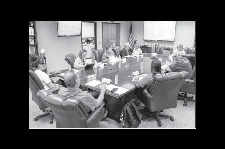 Coaches Prep For College Softball Playoffs