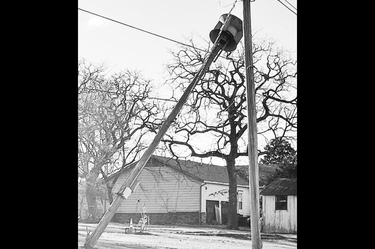 A pole holding one of Seminole’s storm warning sirens in the 400 block of A Street was knocked over by high winds Tuesday night. Emergency Management Director Ernie Willis says another siren, located near the Bus Station, is currently inoperable. —Pho