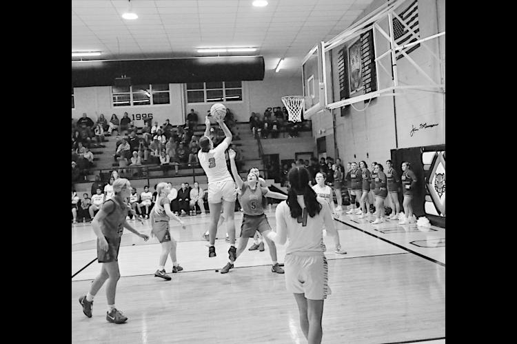 Wewoka Lady Tiger Leilani Scott takes the shot just outside the paint Friday night. Staff Photo by Bill Anderson