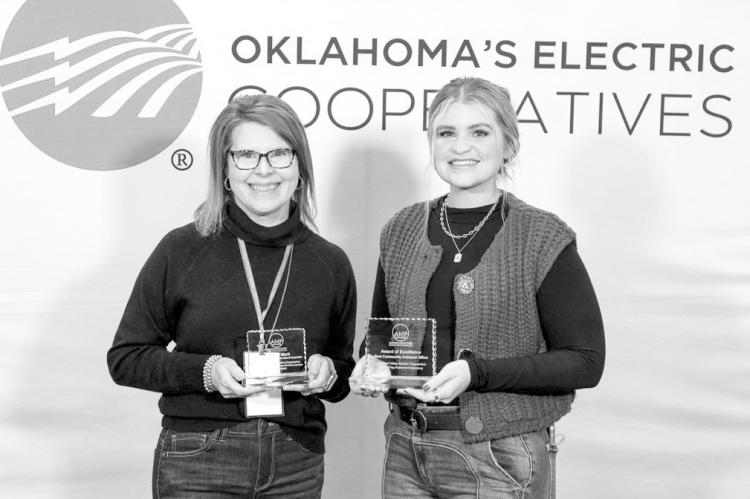 Pictured left to right are CVEC employees Carla Tollett, Director of Communications and Member Engagement and Kaci Dennis, Communications Outreach Coordinator. Not pictured is Kelsey Vargas, Digital Marketing Associate. The CVEC Marketing Team recently wo