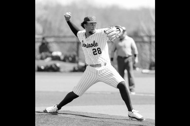 Seminole State Pitcher Jaxon Ramos delivers a pitch in a relief roll for the Trojans. Courtesy Photo by Glen Bryan