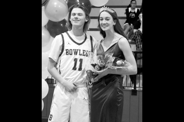 —Staff photo by Andy Wilson Grace Dunagan (right), escorted by Jacob Lewis, was crowned the 2025 Bowlegs Basketball Homecoming Queen Friday night. Both the girl’s and boy’s teams posted wins over Schulter, making the night even more memorable.