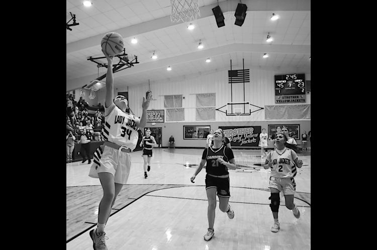 Strother Lady Yellowjacket Brooklyn Turner goes up for the layup Tuesday night. Staff Photo by Andy Wilson