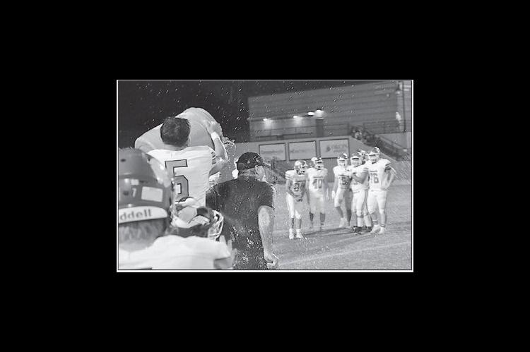 Seminole Chieftain Head Coach Mike Synder gets a Gatorade bath after the 46-12 win over the Knights and earning his 400™ win of his football coaching career. Staff Photo by Bill Anderson