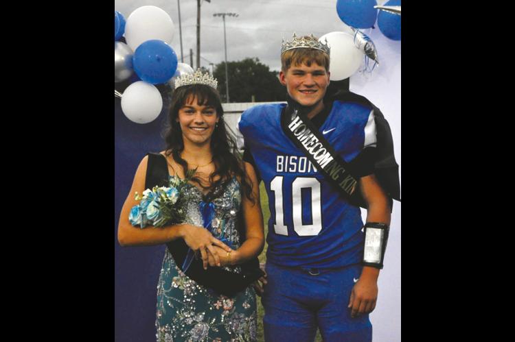 MaryBeth Dunagan and Kaleb Reiter were crowned as Bowlegs Homecoming Queen and King Thursday evening before the Bowlegs Bisons’ game against Midway. Homecoming was capped by a 55-8 victory over Midway. —Staff Photo by Bill Anderson