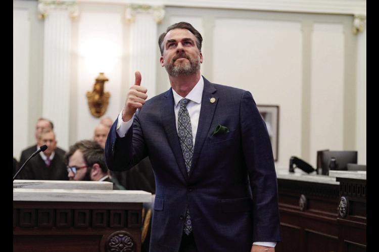 Gov. Kevin Stitt gives a thumbs up while delivering the State of the State Address on Feb. 3, 2025. (Photo by Kyle Phillips/For Oklahoma Voice)