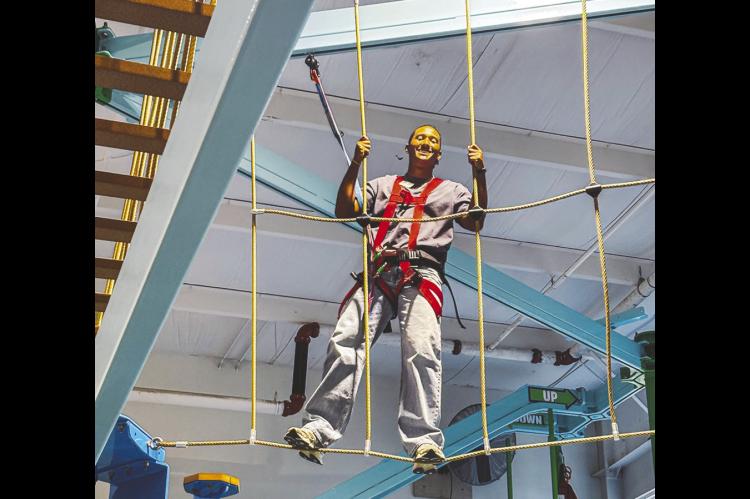 Seminole State College President’s Leadership Class student Keyan Brown of Conway, Arkansas, navigates the climbing maze at the Jasmine Moran Children’s Museum following a welcome reception with the students’ parents and guardians on Aug. 25. (Photo provided by SSC)