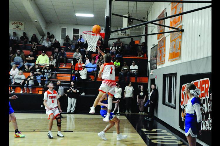 Strother Yellowjacket Peyton Moody flies in for the shot Thursday night. Staff Photo by Bill Anderson
