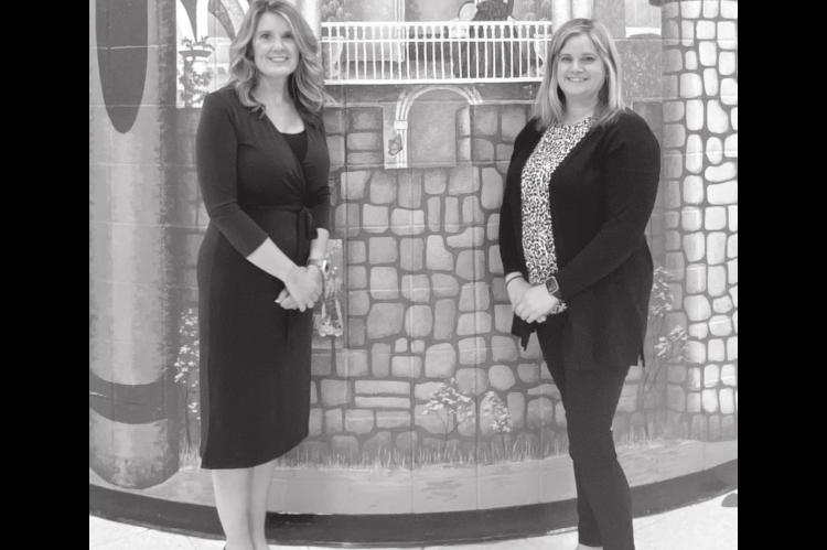 Passing the Baton of Love from Mrs. Willmett, Principal of Betty L. Smith Early Childhood Center