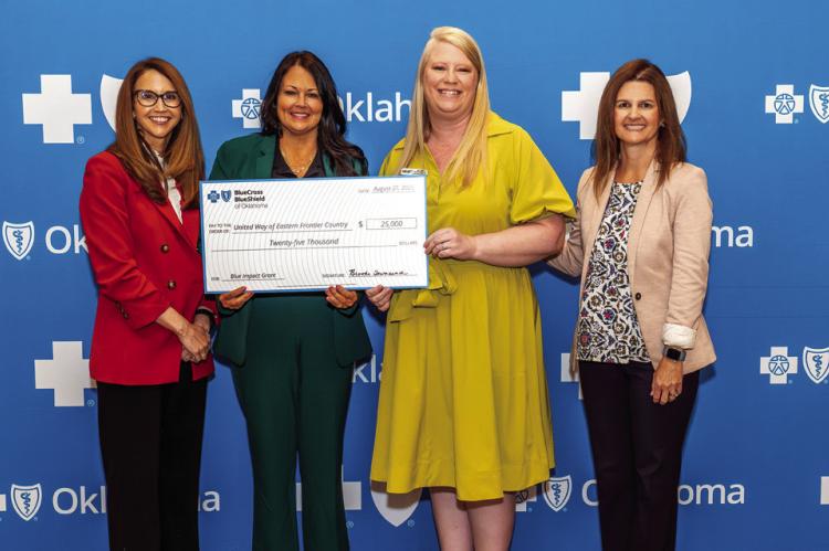 United Way of Eastern Frontier Country Board Chair Ashley Fichtner and Executive Director Sandy Vanderburg accept a grant check from Blue Cross &amp; Blue Shield of Oklahoma in support of the Ride United Transportation Access program. (Courtesy photo)