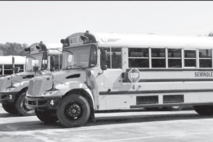 Safety Urged as Buses Begin to Roll Again
